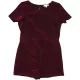 Debenhams Csillogó playsuit (134) lány